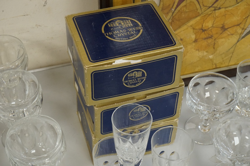 A suite of Thomas Webb Crystal wine glasses, Royal Yacht pattern, including two decanters, eight goblets, white wines and clarets, sixty-four pieces. Condition - mostly good